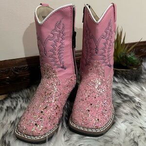 Pink glitter vamp and pink shaft with red and blue western stitching